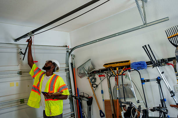 Professional Garage Door Panel Replacement technician working in Montgomery County County, AR